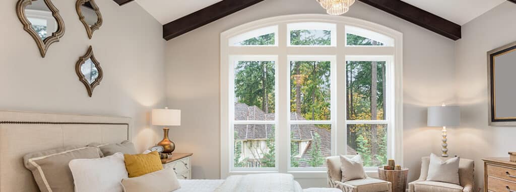 Geometric shaped windows in a bedroom