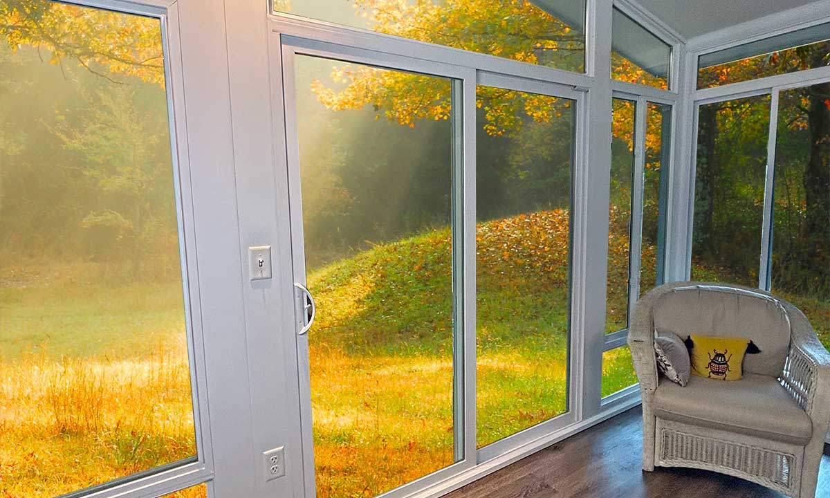 Sunroom patio door with view of nature