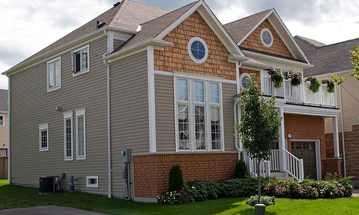 townhome with geometric shape windows