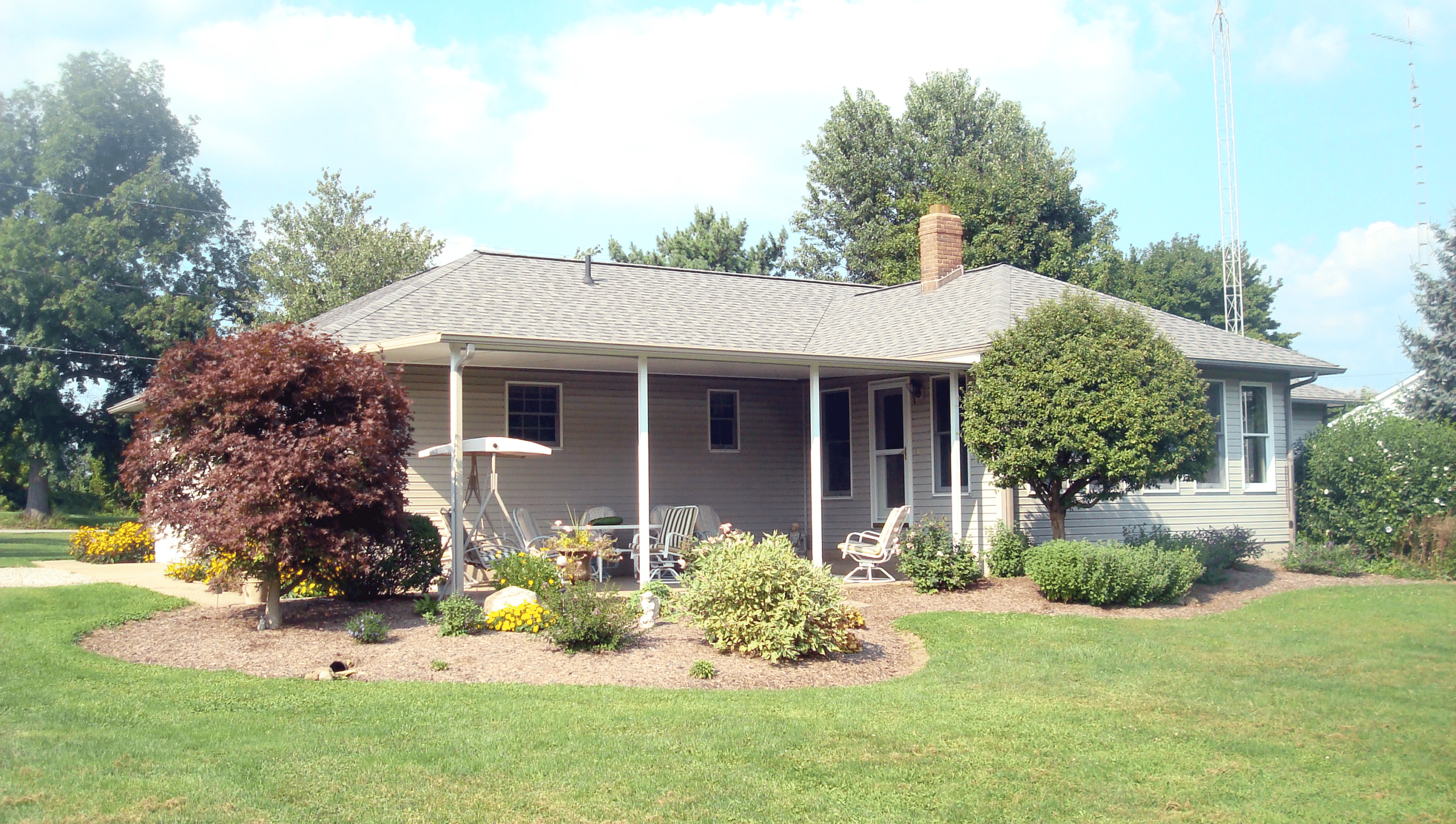 Patio cover and front yard of home
