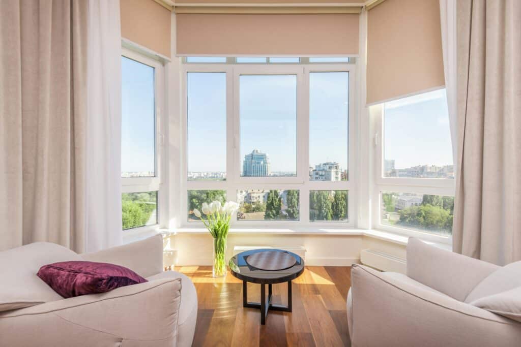 Window in apartment with sun shining through