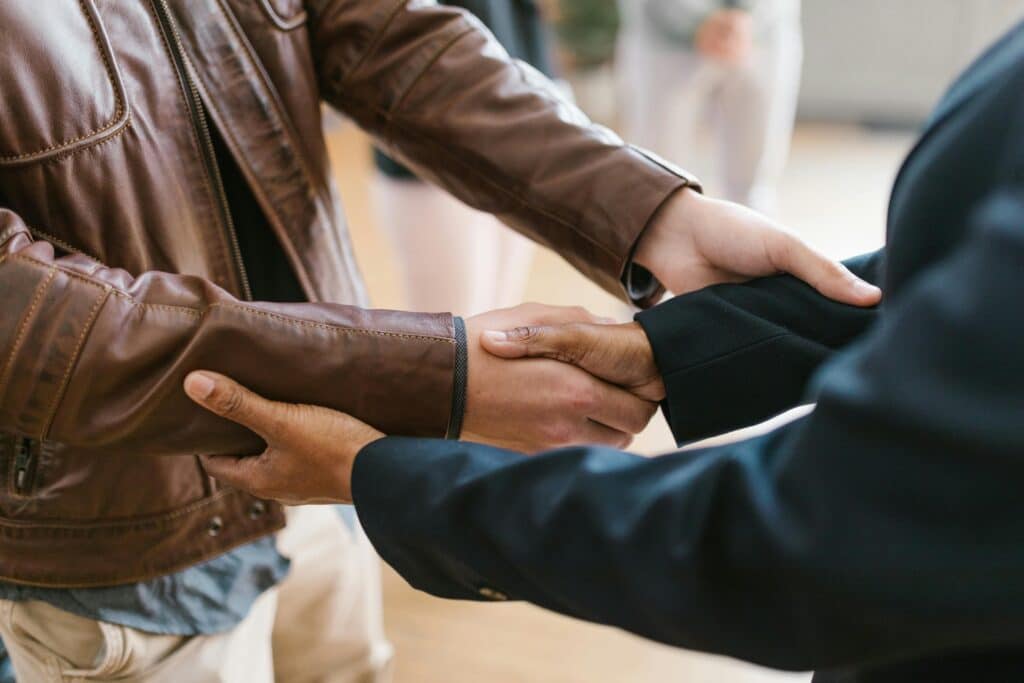 Close up of two hands shaking