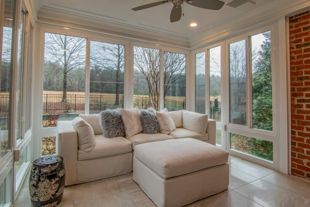 Sunroom with fuzzy couch inside